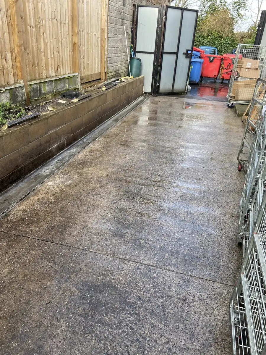 Freshly jet washed concrete walkway South West Bin Cleaning Co